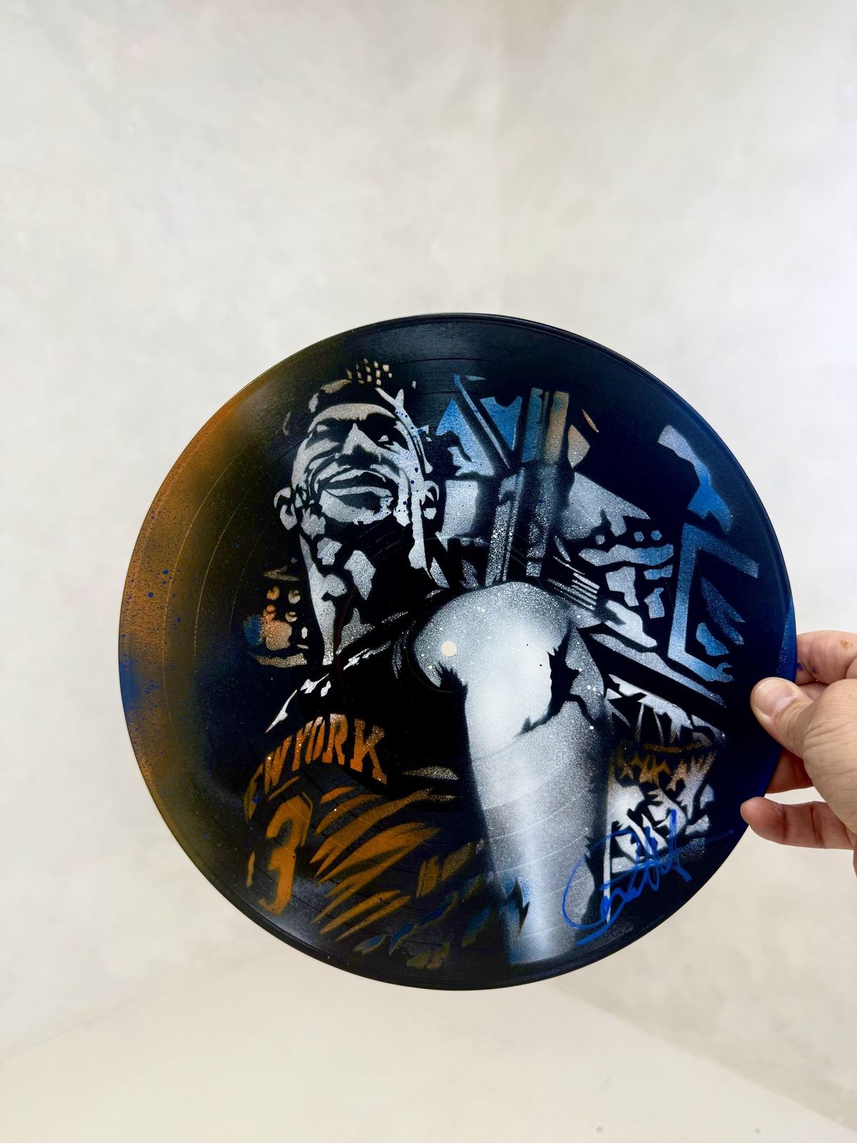 GEM Movement record piece with a Knicks player and city stencils by Andres Gallardo